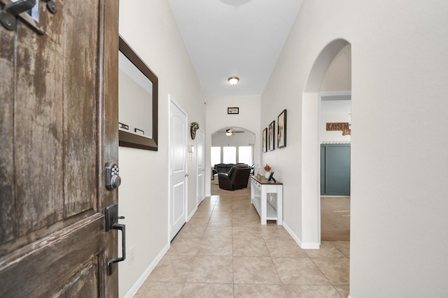 hallway featuring light tile patterned flooring