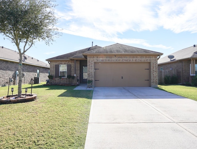 view of front facade with a garage and a front yard