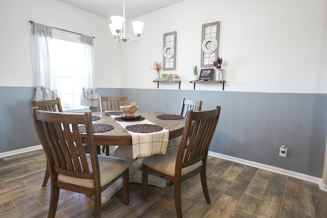 dining space featuring a notable chandelier