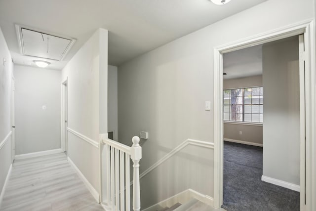 hall with light wood-type flooring