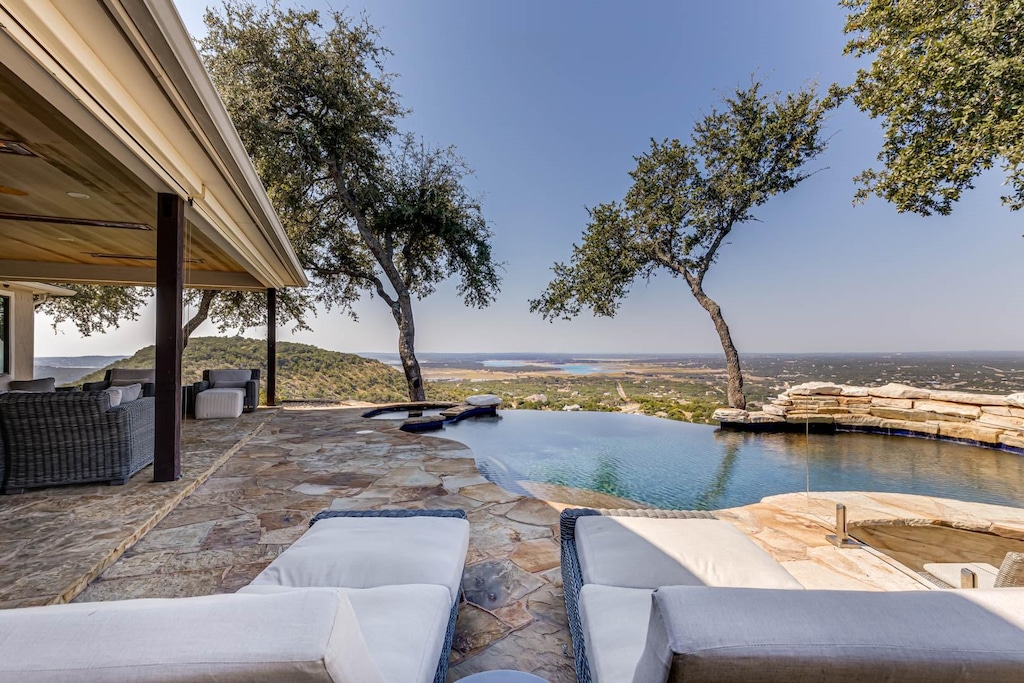 view of patio featuring a water view