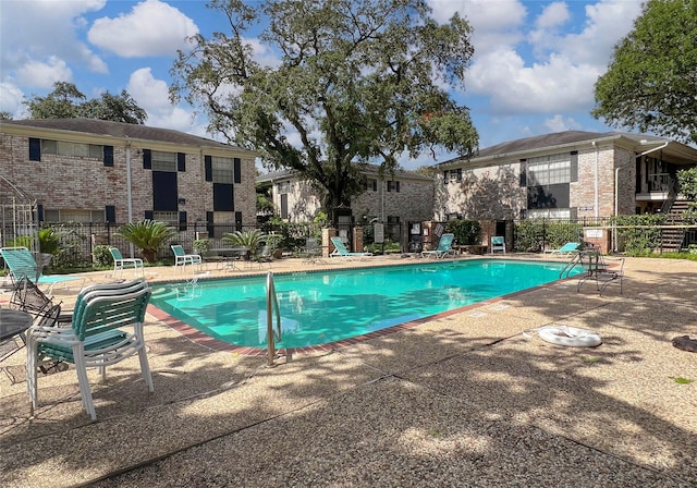 view of pool with a patio area