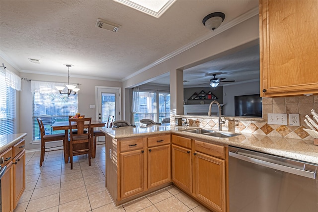 kitchen featuring stainless steel dishwasher, tasteful backsplash, sink, kitchen peninsula, and light tile patterned floors