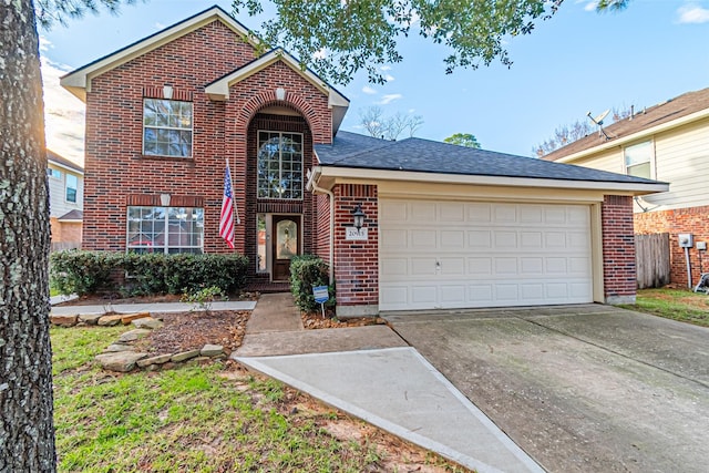 front of property with a garage