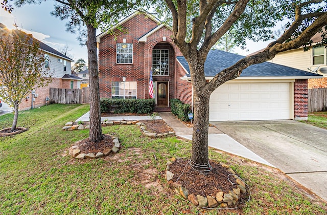 view of property with a garage and a front yard