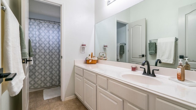 bathroom with vanity and walk in shower