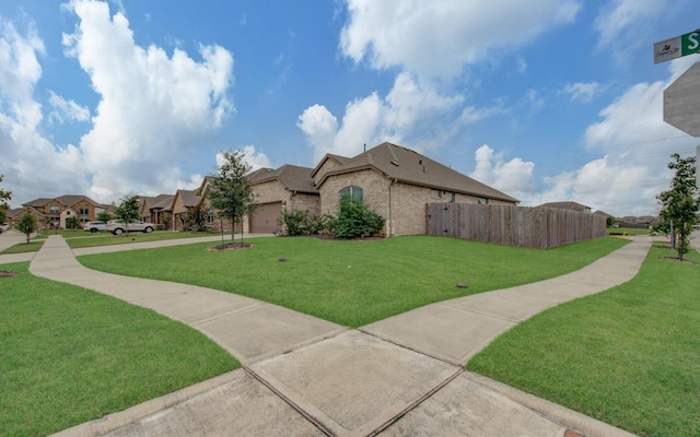 exterior space featuring a yard and a garage