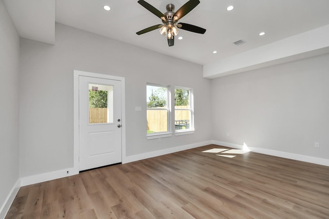 entryway featuring ceiling fan and light hardwood / wood-style floors