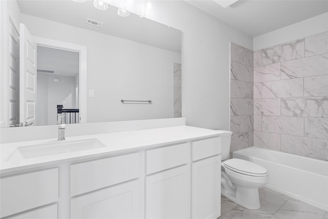 full bath with toilet, marble finish floor, visible vents, vanity, and tub / shower combination