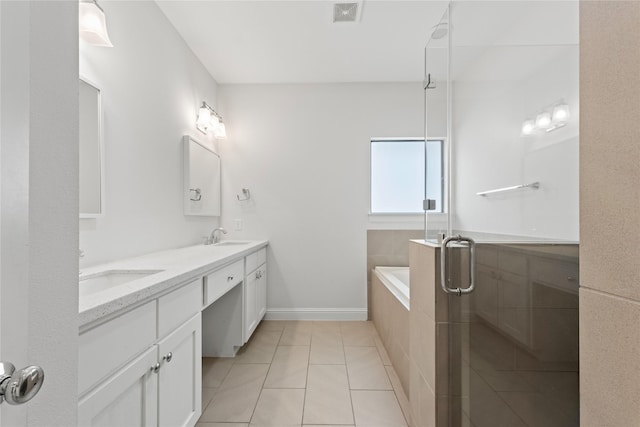 bathroom featuring tile patterned flooring, vanity, and independent shower and bath