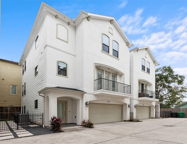 townhome / multi-family property featuring a garage