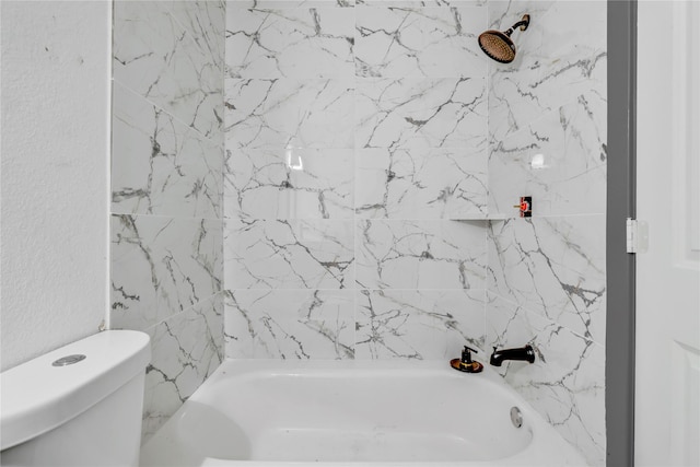 bathroom featuring toilet and shower / bathing tub combination