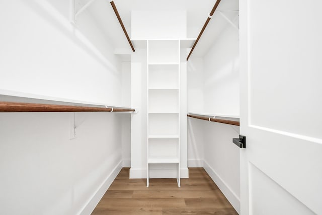 walk in closet featuring light wood-type flooring