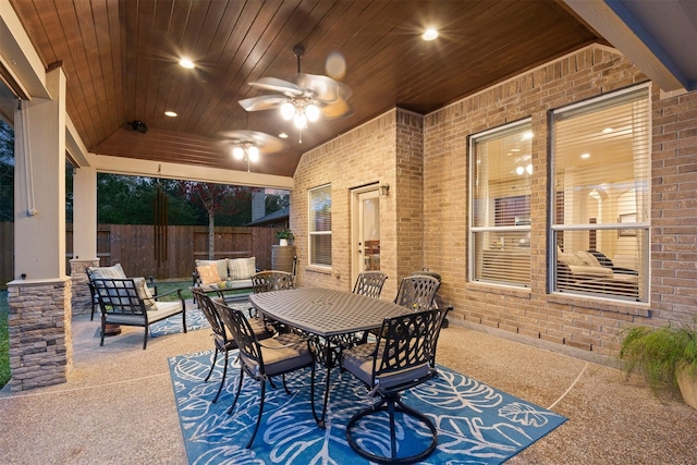 view of patio / terrace with ceiling fan and an outdoor living space