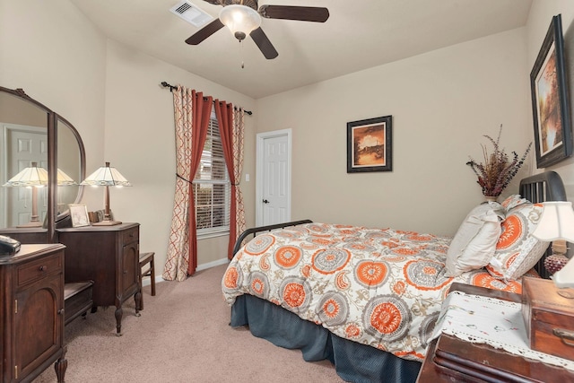 bedroom with light colored carpet and ceiling fan