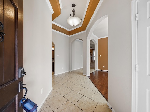 tiled entryway with crown molding