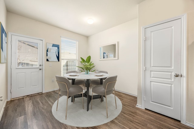 dining room featuring dark hardwood / wood-style flooring