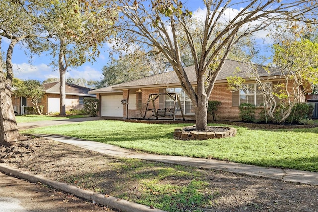 ranch-style home featuring a front lawn and a garage