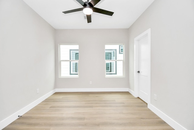 spare room with ceiling fan and light hardwood / wood-style flooring