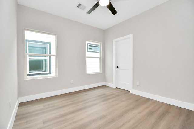 unfurnished room with ceiling fan and light hardwood / wood-style flooring