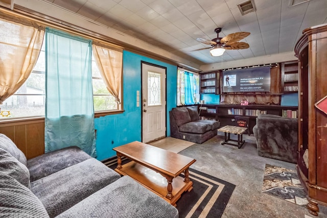 living room featuring ceiling fan