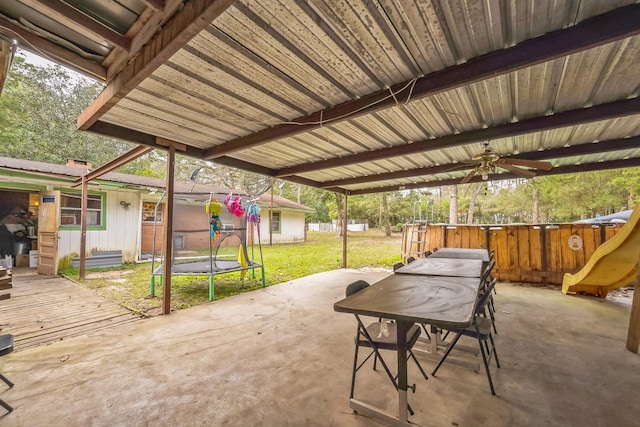 view of patio / terrace with a trampoline and ceiling fan