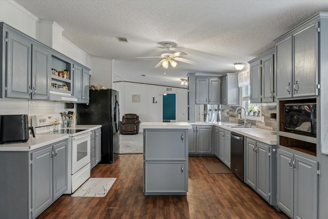 kitchen with dishwasher, a kitchen island, white range with electric cooktop, sink, and gray cabinetry