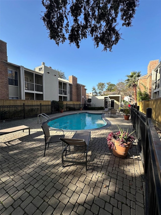 view of pool with a patio area