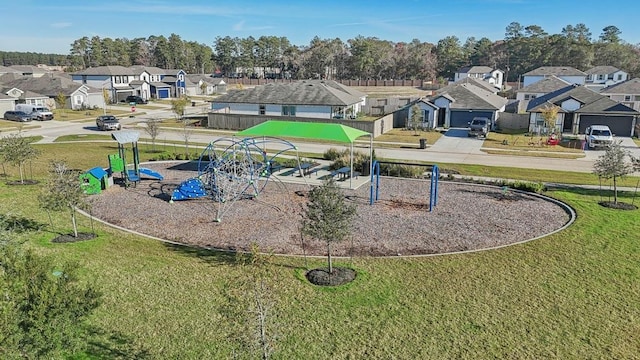 view of playground featuring a lawn