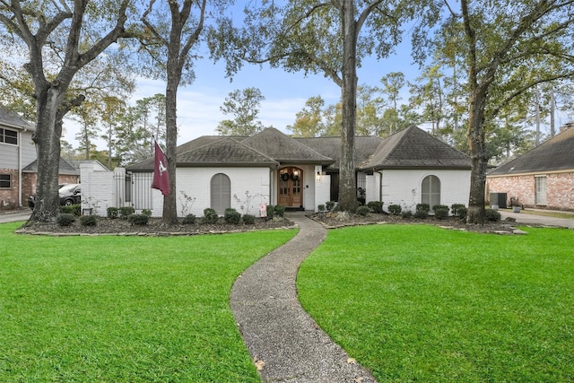 ranch-style house with a front yard