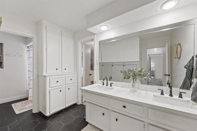 bathroom featuring vanity and tile patterned floors