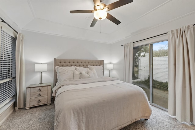 bedroom featuring access to exterior, ceiling fan, and carpet flooring