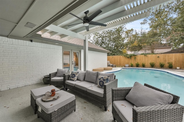 view of swimming pool with a pergola, a patio area, outdoor lounge area, and ceiling fan