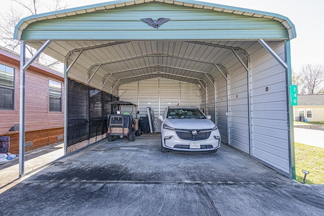 view of parking / parking lot featuring a carport