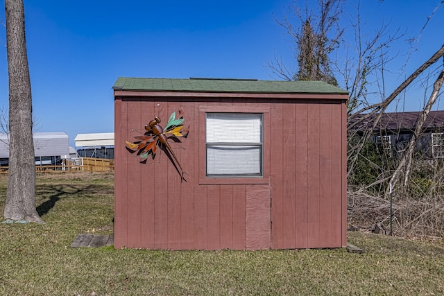 view of outdoor structure featuring a yard