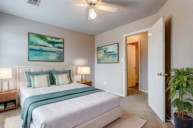 bedroom with ceiling fan and light colored carpet