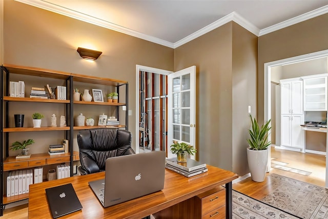 home office featuring crown molding and hardwood / wood-style floors