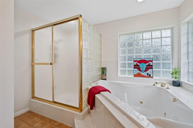 bathroom with plus walk in shower and tile patterned floors