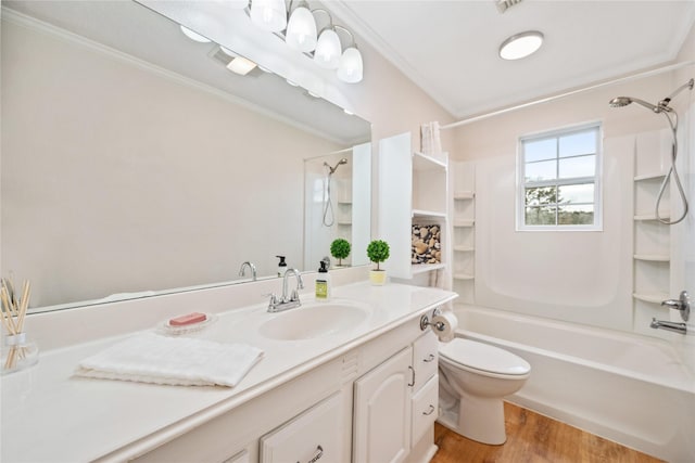 full bathroom with toilet, shower / bath combination, hardwood / wood-style floors, crown molding, and vanity