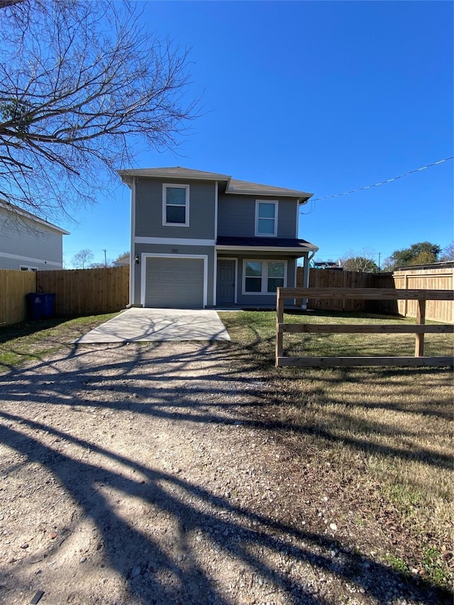 front of property featuring a garage