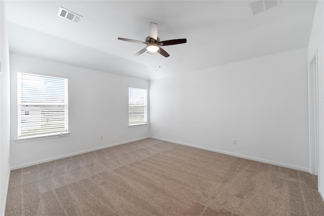 carpeted empty room with ceiling fan