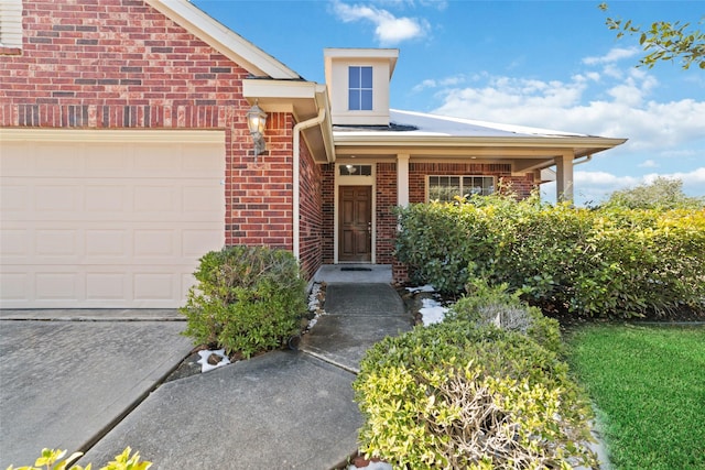 entrance to property with a garage