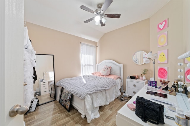 bedroom with vaulted ceiling and ceiling fan