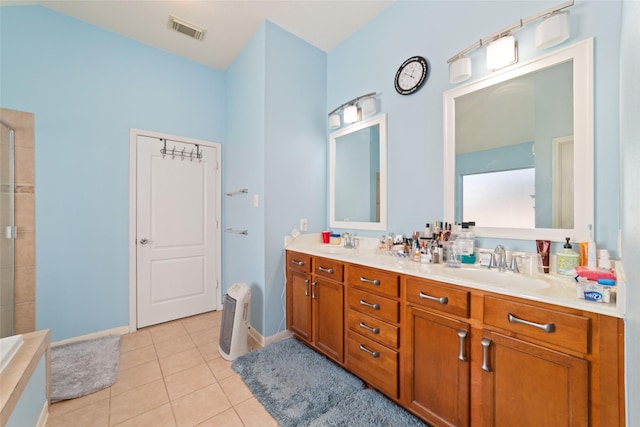 bathroom with vanity and tile patterned floors