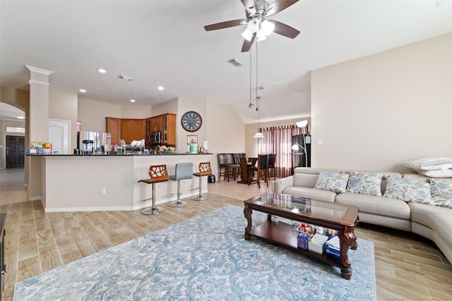 living room with ceiling fan