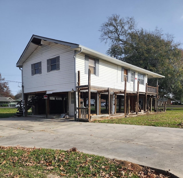 view of front of property with a carport