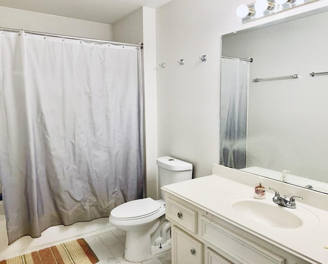 full bathroom with vanity, toilet, and shower / tub combo with curtain