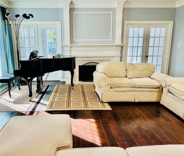 sitting room with dark hardwood / wood-style flooring, crown molding, and french doors