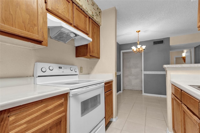 kitchen with light tile patterned floors, electric range, a textured ceiling, a chandelier, and pendant lighting