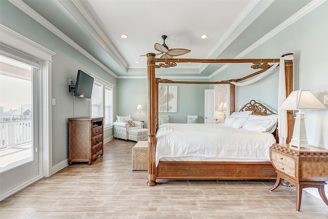 bedroom featuring ceiling fan, access to outside, a raised ceiling, crown molding, and light hardwood / wood-style flooring